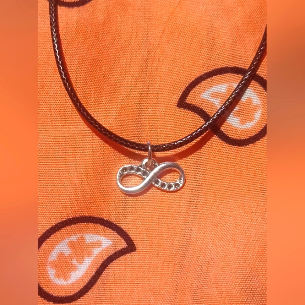 Black cord necklace with infinity charm